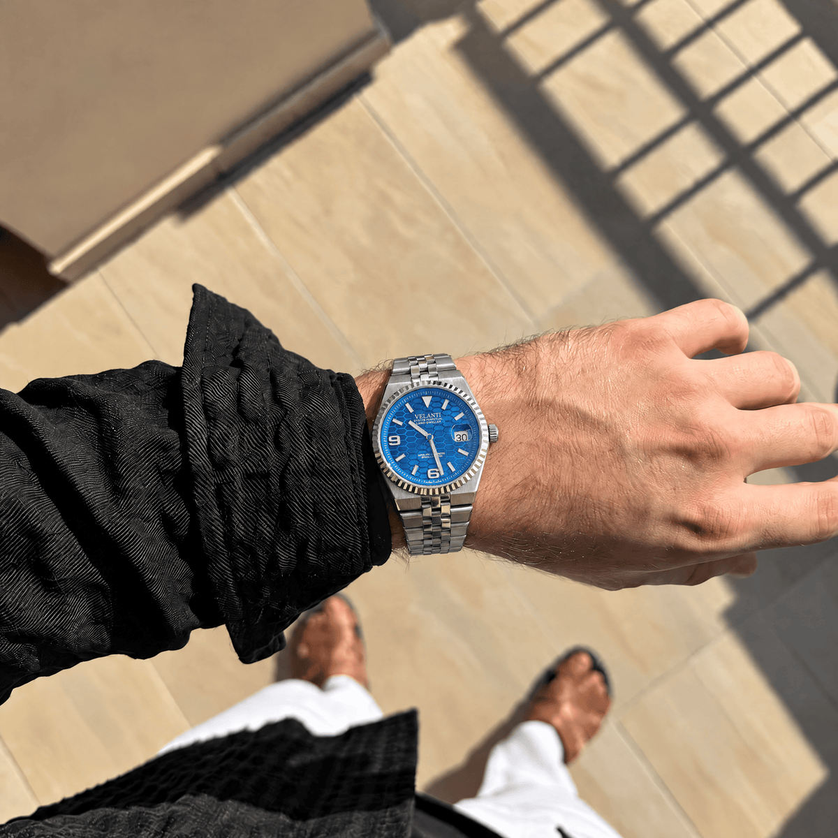 Landvel Silver - Blue watch worn on the wrist, showing the dial and bracelet.