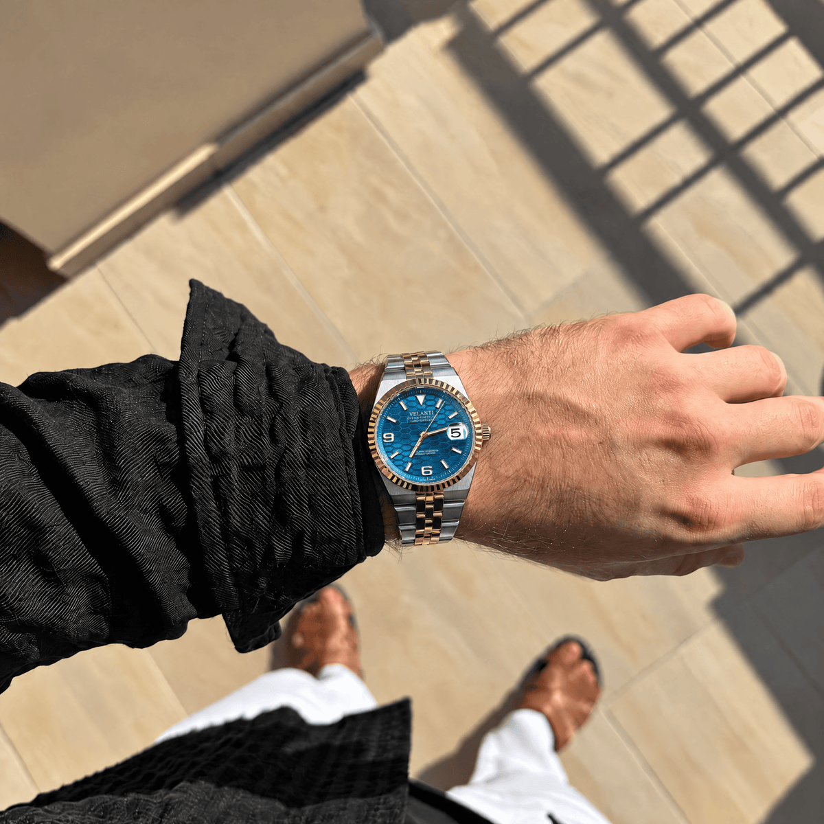 Landvel Silver - Gold (Blue) watch worn on the wrist, showing the dial and bracelet.