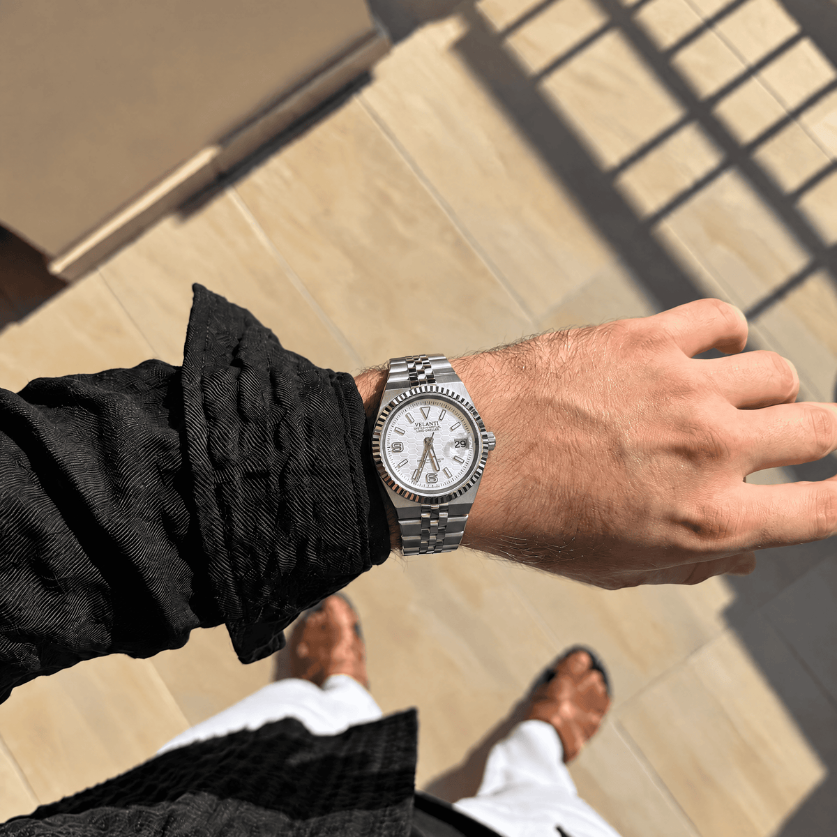 Landvel Silver - White watch worn on the wrist, showing the dial and bracelet.