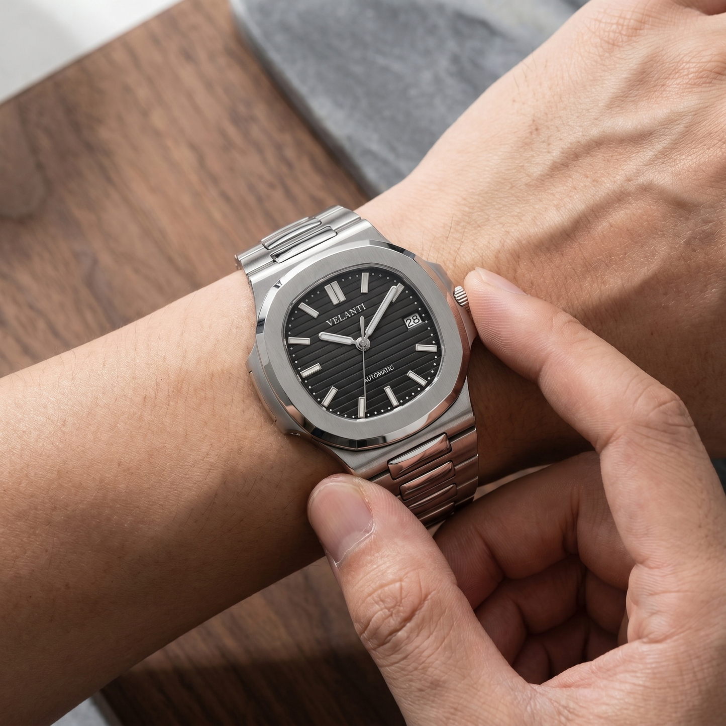 Nautilus-style custom mod watch, Velanti Milano Nautvel Black worn on wrist photo 5